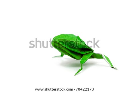 Green paper frog origami, isolated on white