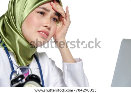 Stressful young doctor due to work overload and long working hours concept.