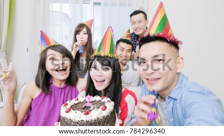people smile happily with birthday party in the home