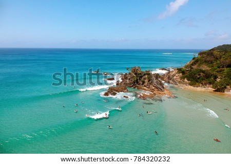 Surfing the Pass, Byron. Royalty-Free Stock Photo #784320232