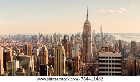 Manhattan Midtown Skyline with illuminated skyscrapers at sunset. NYC, USA Royalty-Free Stock Photo #784411462