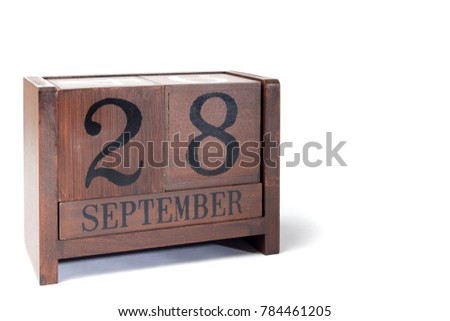 Wooden Perpetual Calendar set to September 28th