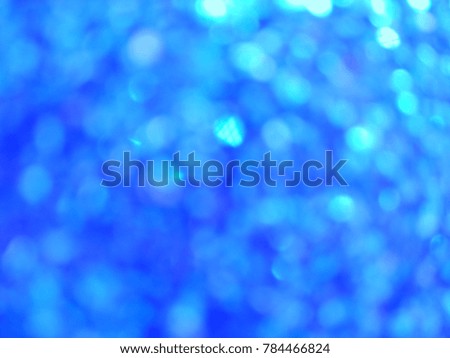 Decorative Abstract out of focus lights with abstract background of Blue. Good for Diwali, Christmas and New Year celebrations. Abstract background of Blue and white color. 