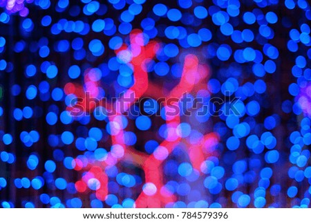 Abstract blue bokeh lights background at night for party and celebration concept