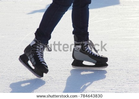 foot ice-skating person on the ice rink
