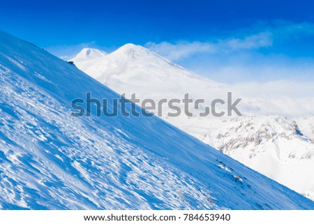 Beautiful amazing day.  Mountains inspiring. Winter white snow landscape. Mount Elbrus