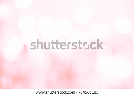 abstract blur beautiful rose gold color background with glow bokeh light 