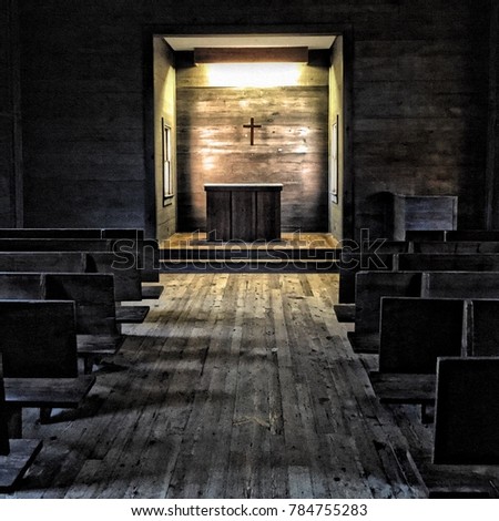Interior of old church showing wooden pews and alter with cross, very simplistic Royalty-Free Stock Photo #784755283