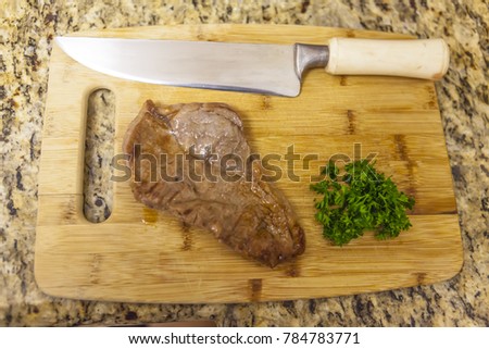 Grilled New York beef steak and herbs