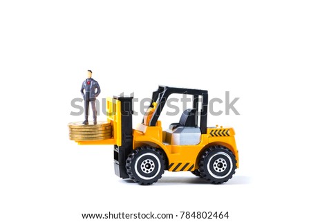 Mini forklift truck loading stack coin with steps of gold coin, isolated on white background with copy space, business finance and banking industrial concept idea.