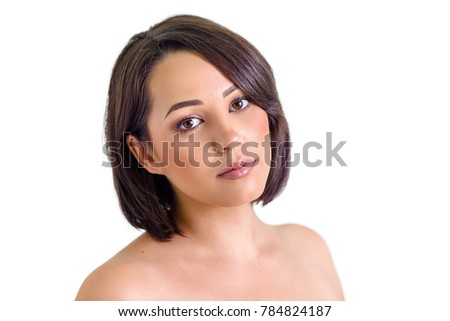 Beautiful young woman portrait with perfect clean skin isolated on white background