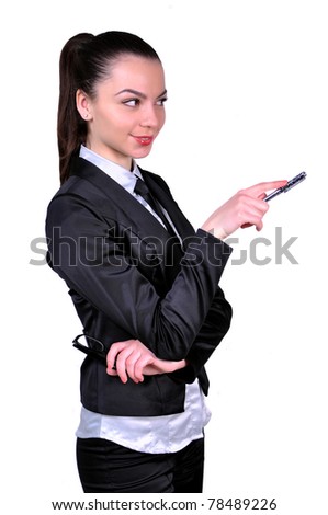 beautiful young business woman with pen showing something over white