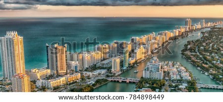 Wonderful skyline of Miami at sunset, aerial view.