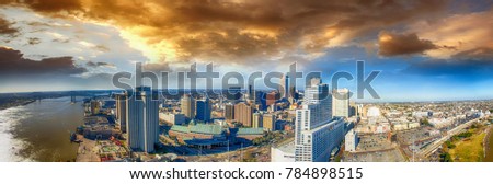 Panoramic aerial view of New Orleans on a stormy day.