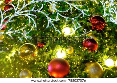 A lot of gold and red ball with Christmas ornament hanging on Christmas tree. Concept be used for Christmas day and Happy New Year. Blur picture. Vintage style.