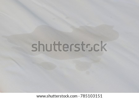 Bedwetting, Adult or children pee on the bed. Selection focus on the wet sheet. Royalty-Free Stock Photo #785103151