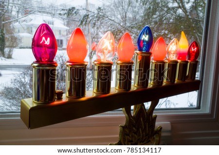 Jewish holiday, Hanukkah (Chanukah) menorah on a windowsill