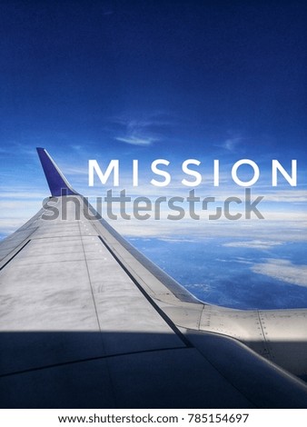 Mission wordings near to wing airplaneon the blue sky