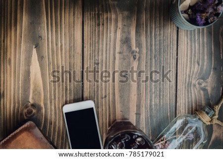 top view of Traveler's accessories, Flat lay photography of Travel concept with copy space at text of picture. Creative table, Dark tone filter