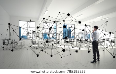 Elegant businessman in modern office interior and social connection concept. Mixed media