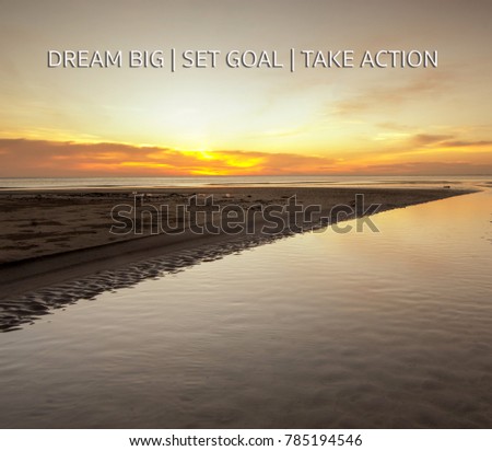 words Dream big, set goal, take action written on blurred sunset background. motivation concept.