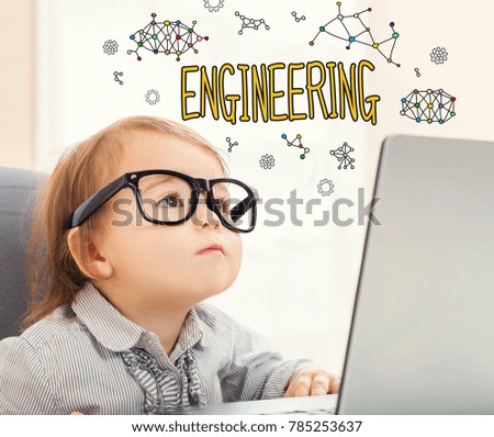 Engineering text with toddler girl using her laptop