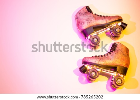 Retro pink glittery roller skates - poster layout design. Colorful (multicolor tonal transitions) background with free text (copy) space.