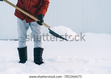 Snow Removal in Wintertime Royalty-Free Stock Photo #785266675