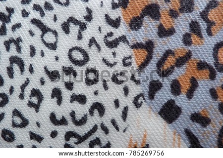 motley colored fabric scarf dress close-up background for design background textile cloth clothes vintage natural fabric flax cotton wool abstract illustration white-black leopard print drawing