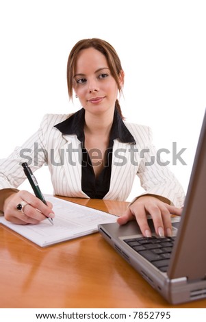 Beautiful business woman working in her office - over a white background