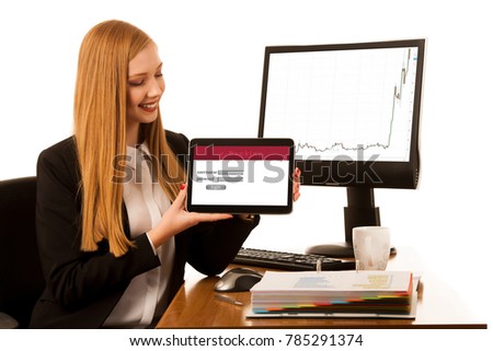 Beautiful young business woman surf internet on tablet in office - e bankinf finance and investment