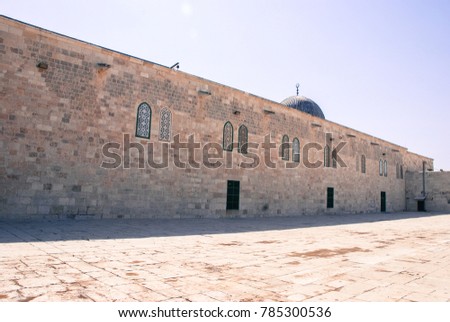 Horizontal picture of brick wall and beautiful windows of Al Aqsa Mosque located inside the walls of Old Jerusalem, Israel.