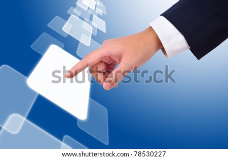 The hand of a business man is touching a bright white button with a blue background.
