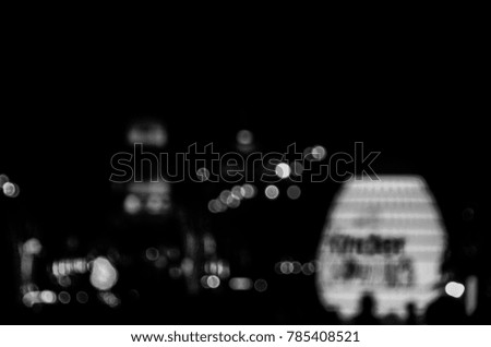 black and white blurred city lights