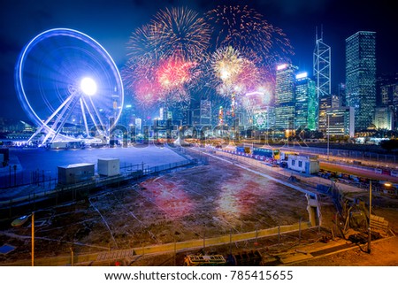 Double Exposure of Firework and City 