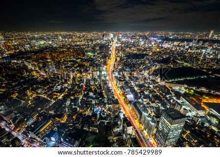 Asia Business concept for real estate & corporate construction - panoramic modern city skyline view of Shibuya & Tokyo Metropolitan Expressway with neon night in Roppongi Hill, Tokyo, Japan
