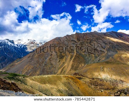 Snow and sandy mountains in Spiti Valley, Himachal Pradesh, India.