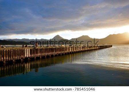 Beautiful sunset at the marina pier in Hawaii