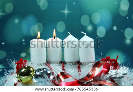 Second Advent Sunday/ candles on an advent wreath/ White candles on an advent christmas wreath.