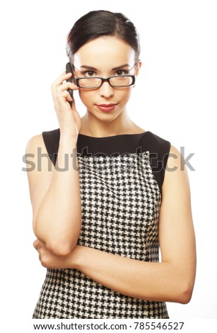 Young business woman with mobile phone