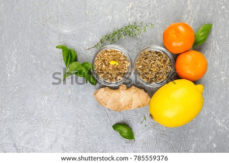 Concept of natural medicine. Natural remedies for colds on grey background. Flat lay. Copy space.