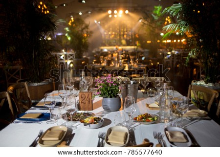 Served for banquet tables in a luxurious interior. Royalty-Free Stock Photo #785577640