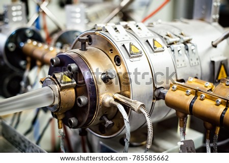 Extruder machine for extrusion of plastic material, close-up view Royalty-Free Stock Photo #785585662