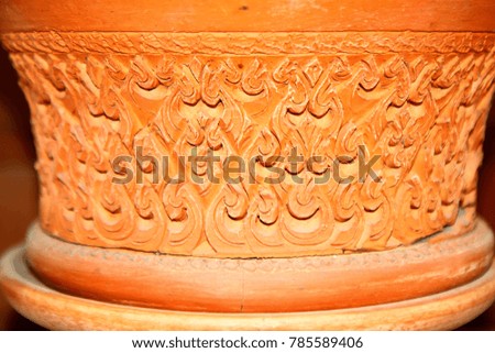 Earthenware for home decor, handmade pattern on ancient pottery.