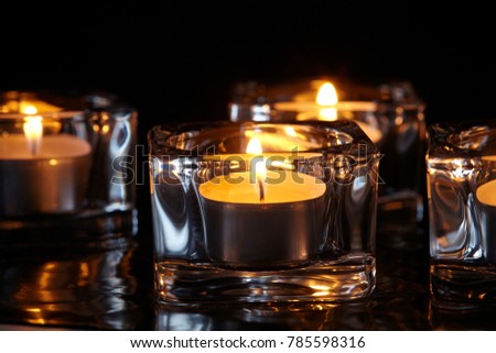 candle lights on black background