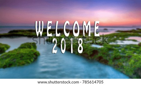 WELCOME 2018 text with the blurred landscape during sunset.