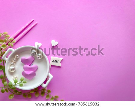 Serving LOVE and HEART for Valentines day on pastel pink background. Sweet love and relationship concept.