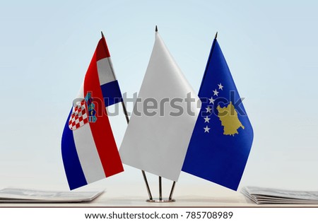 Flags of Croatia and Kosovo with a white flag in the middle