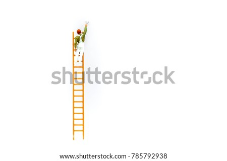Miniature people: Worker with ladder on white background and copy space using as background business concept.