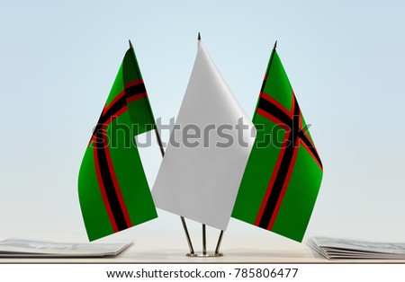 Two flags of Karelia with a white flag in the middle